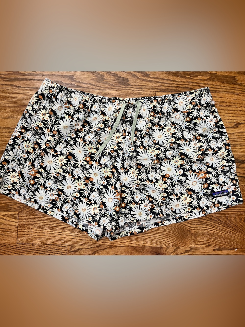 Patagonia Baggies Black Floral Daisy Print Shorts with White and Tan Accents